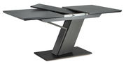 Moderner, ausziehbarer Tisch in dunklem Holz mit schrägem Standfuß, seitliche Perspektive