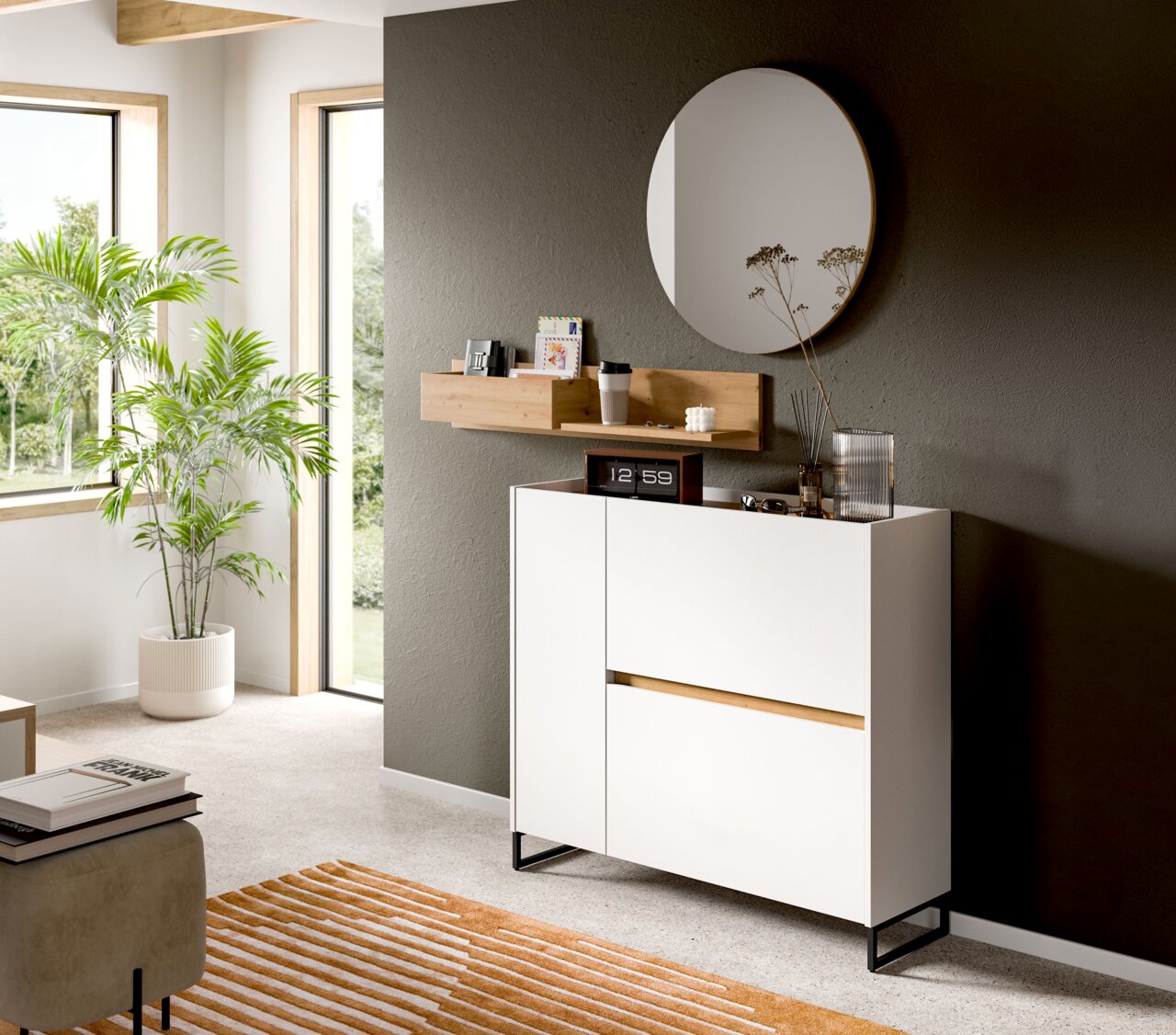 Modernes weißes Sideboard mit Holz-Akzent und schwarzem Metallgestell unter rundem Wandspiegel in einem hellen Wohnraum, perspektivisch in leichter Schrägansicht von vorne rechts