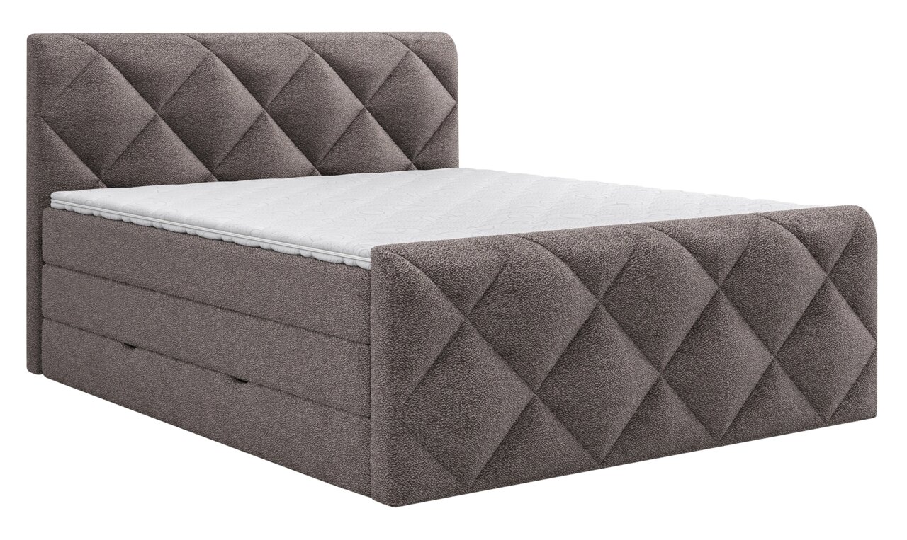 Boxspringbed in zijaanzicht met grijze, doorgestikte hoofd- en voeteneinde.