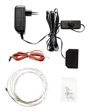 LED-Bandbeleuchtung Set mit Netzteil, Steuerungseinheit, Kabeln und Befestigungsmaterial, aus der Vogelperspektive fotografiert.