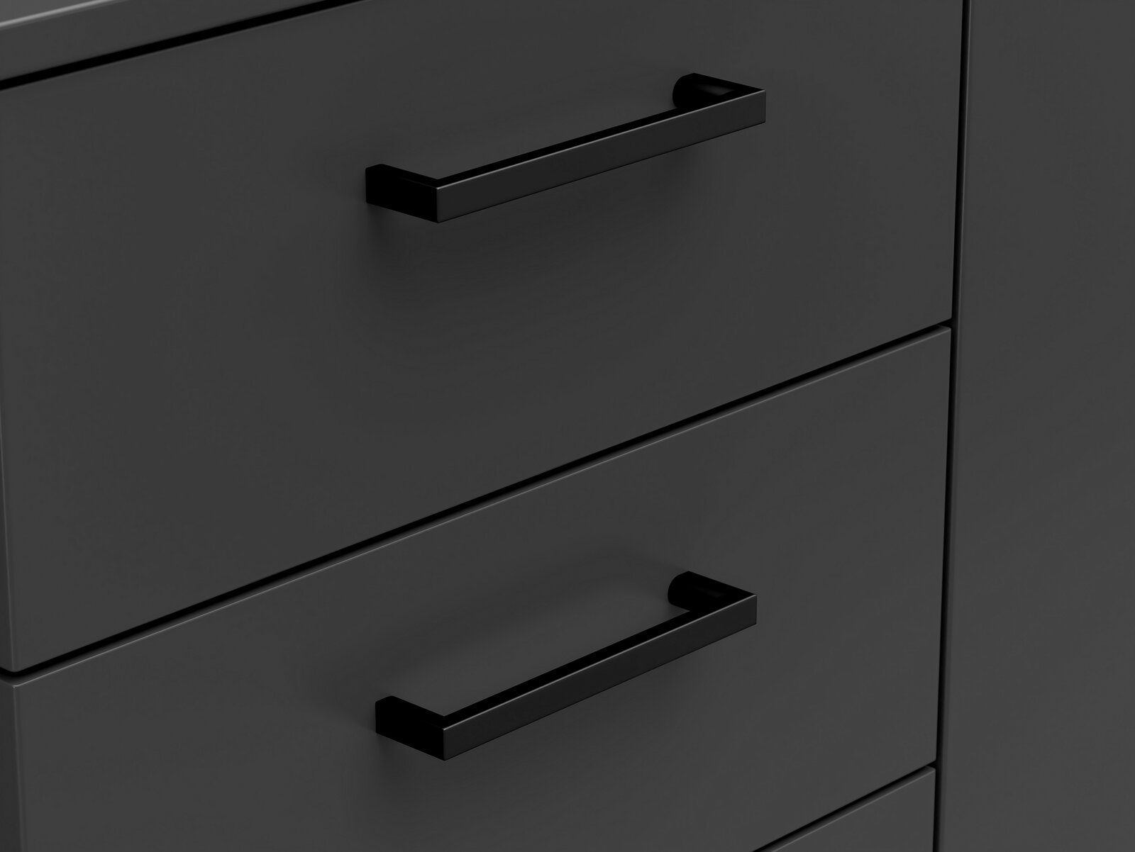 Nahaufnahme einer schwarzen Kommode mit modernen, rechteckigen Griffen, seitliche Perspektive