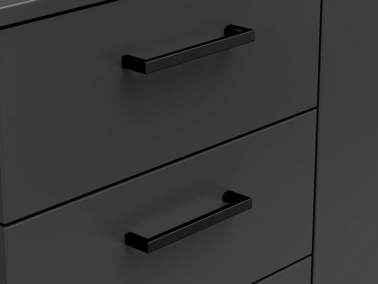 Nahaufnahme einer schwarzen Kommode mit modernen, rechteckigen Griffen, seitliche Perspektive
