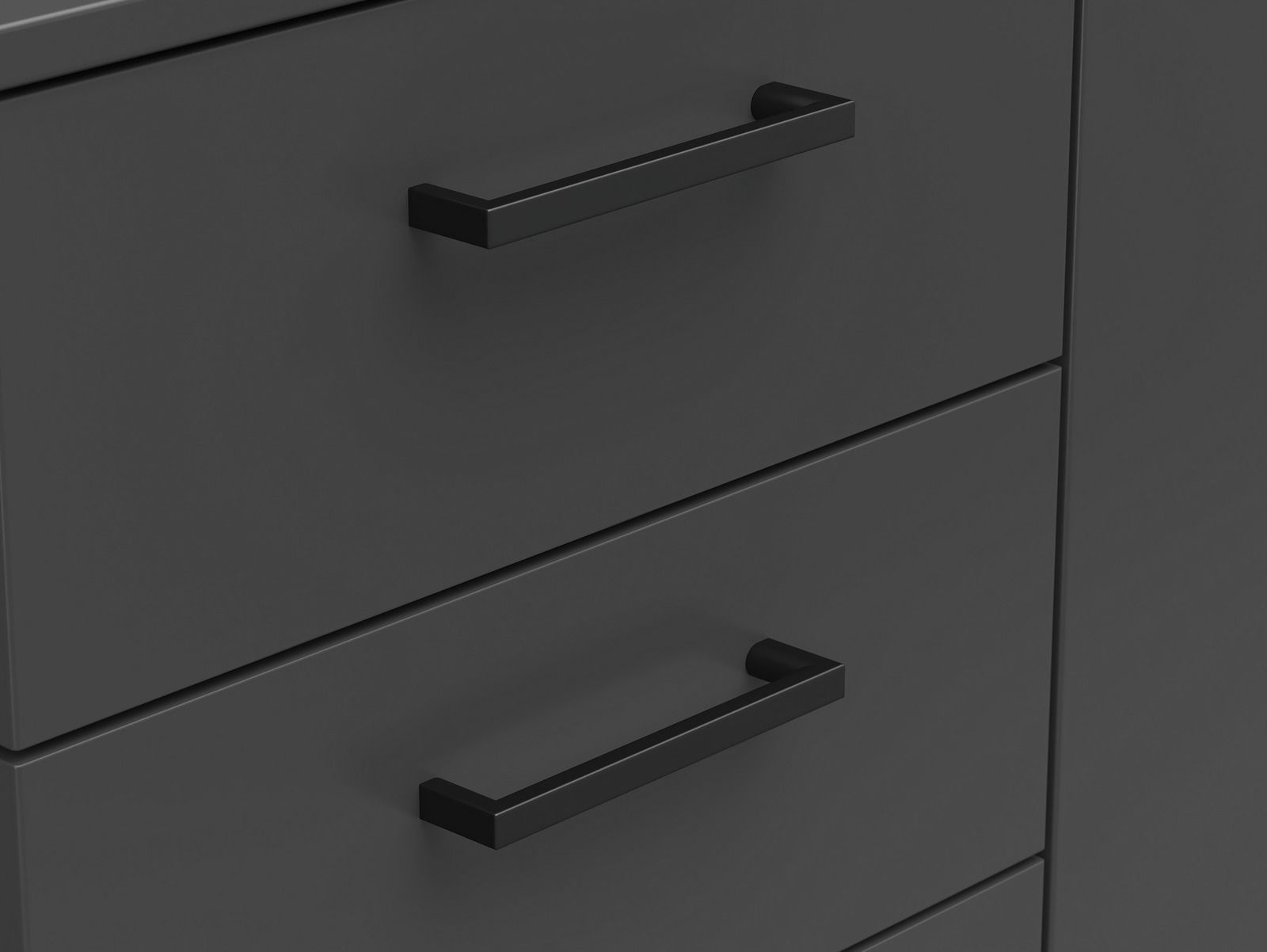 Nahaufnahme einer schwarzen Kommode mit modernen, rechteckigen Griffen, seitliche Perspektive