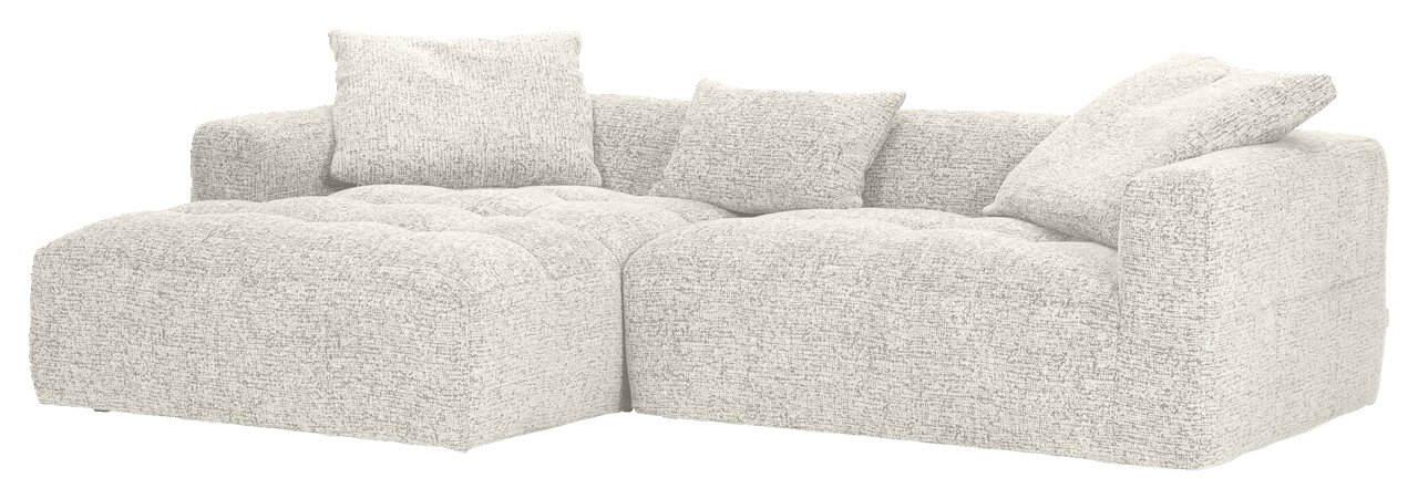 Grote, moderne hoekbank met lichte bekleding en diverse kussens, gezien vanaf de zijkant.