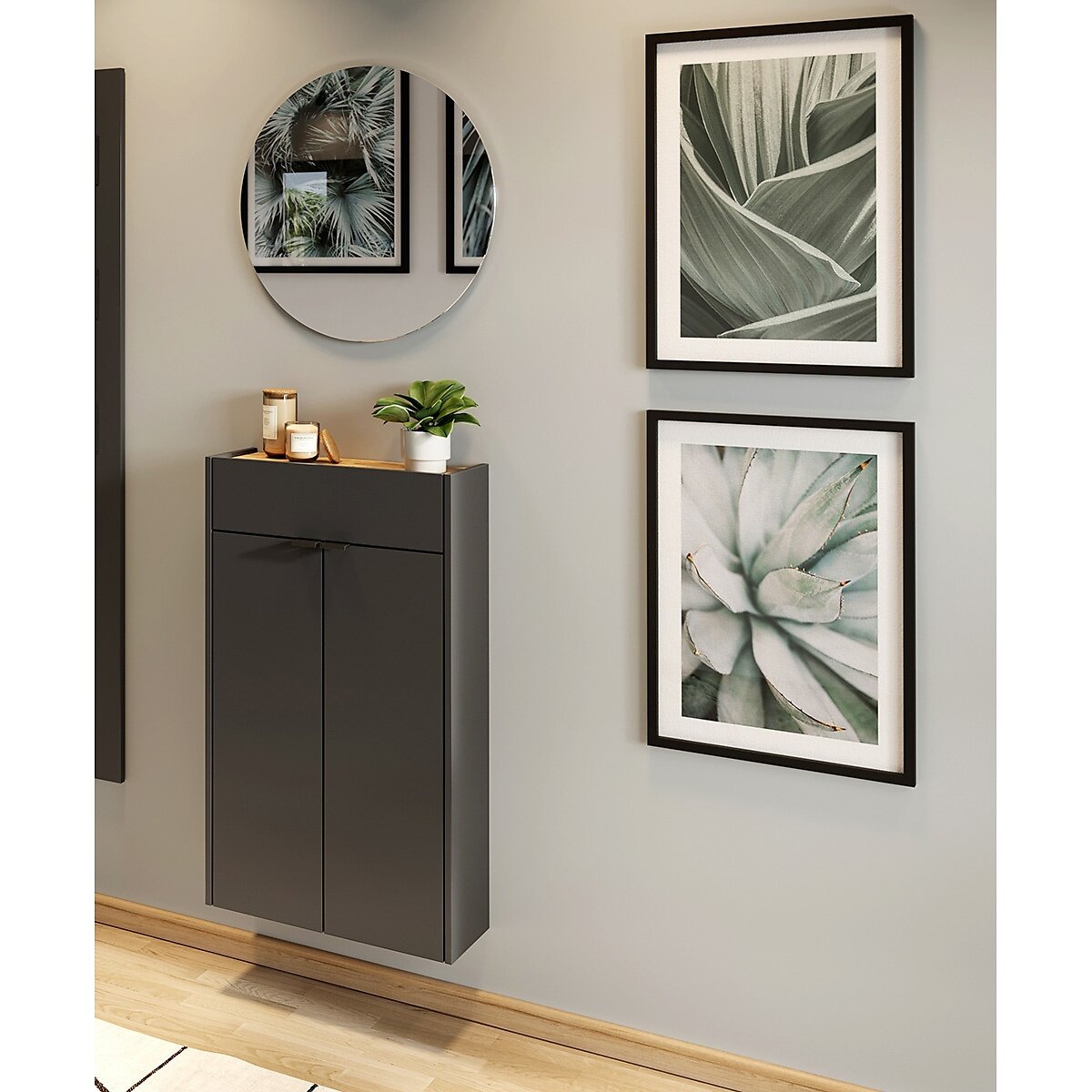 MID.YOU Garderoben-Set AMECA Moderne Garderobe mit dunklem Schrank, rundem Spiegel und Pflanzenbildern an der Wand, aus der Perspektive von vorne betrachtet.