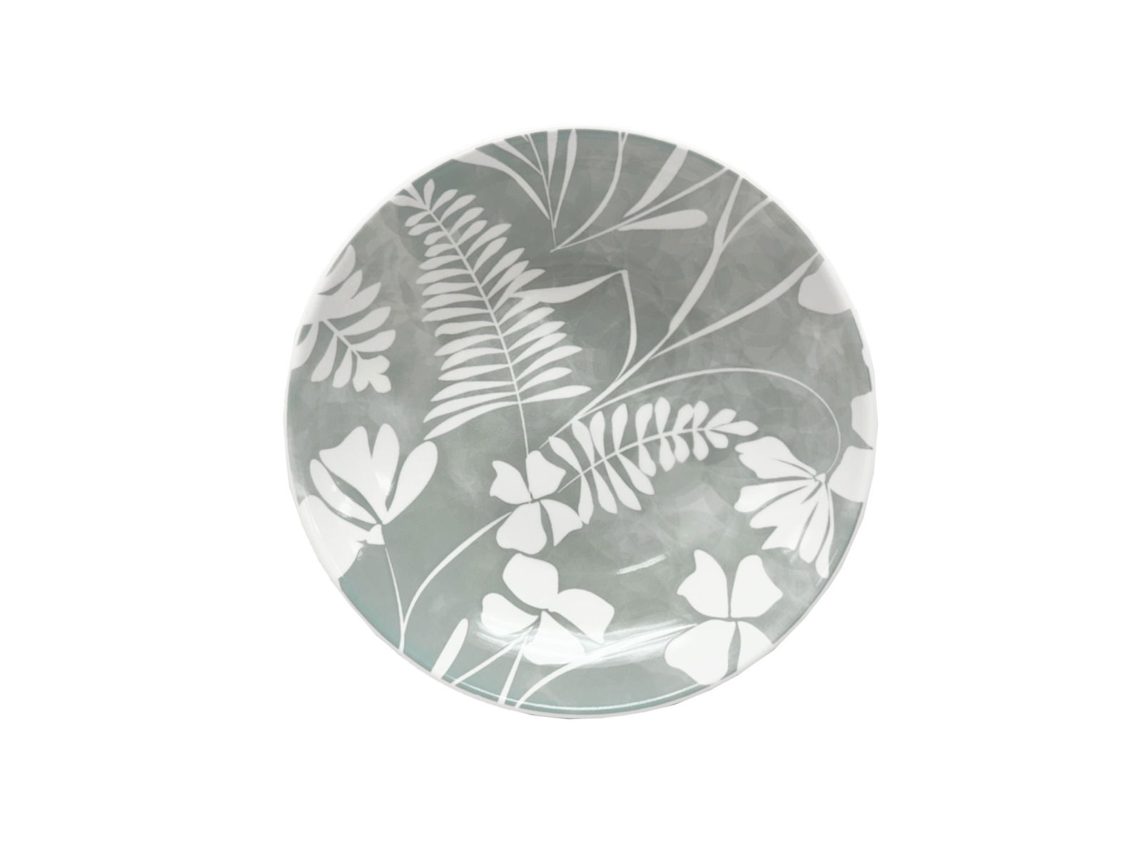 Teller mit floralem Muster in Grau und Weiß, von oben betrachtet.