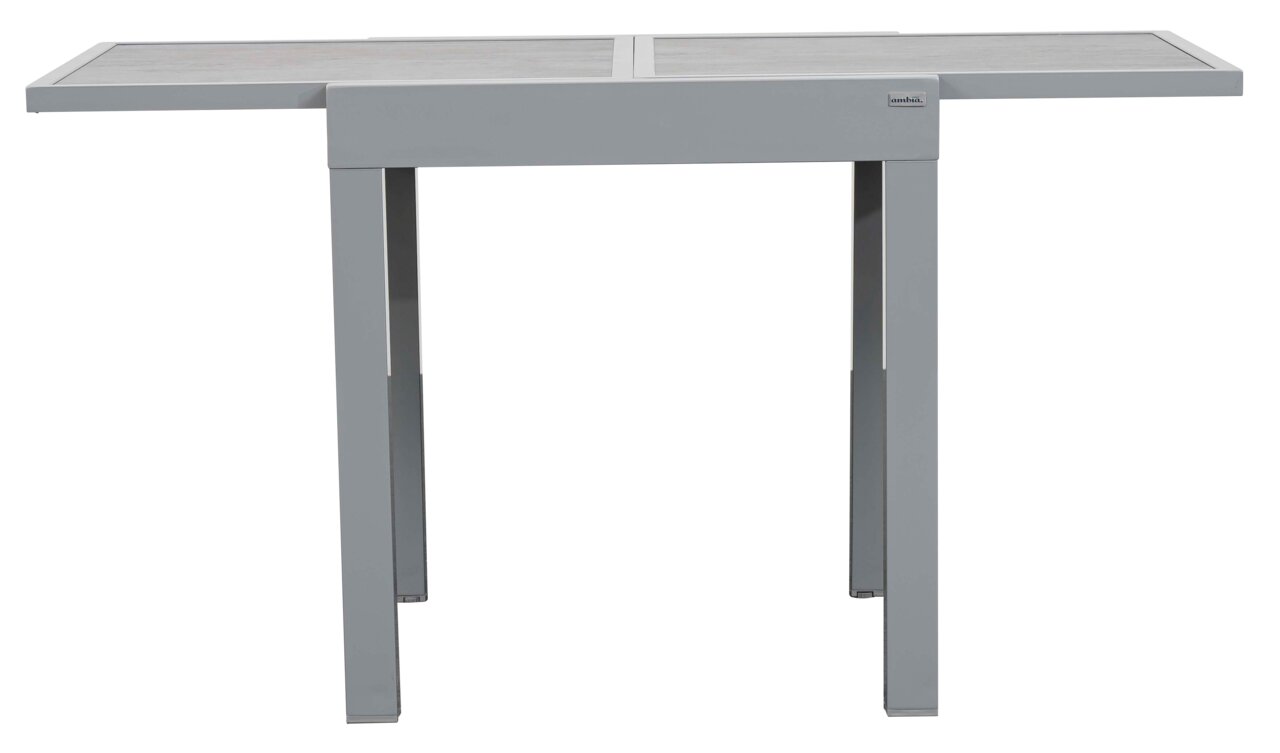 Moderne metalen tuintafel in grijs, van voren gefotografeerd.