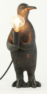 Pinguin-förmige Tischleuchte mit E14-Fassung, die eine Glühbirne hält. Frontalansicht.