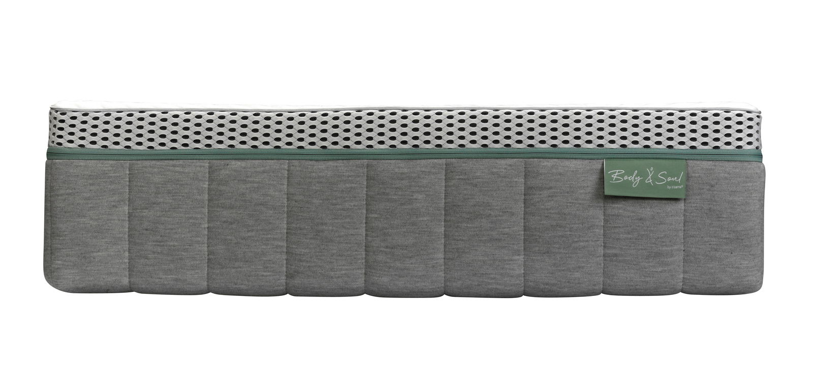 Seitenansicht einer grauen Matratze mit weißem, gepunktetem Oberteil und grünem Etikett.