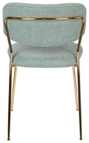 Rückansicht eines modernen Stuhls mit goldenen Metallbeinen und hellgrünem Stoffbezug.