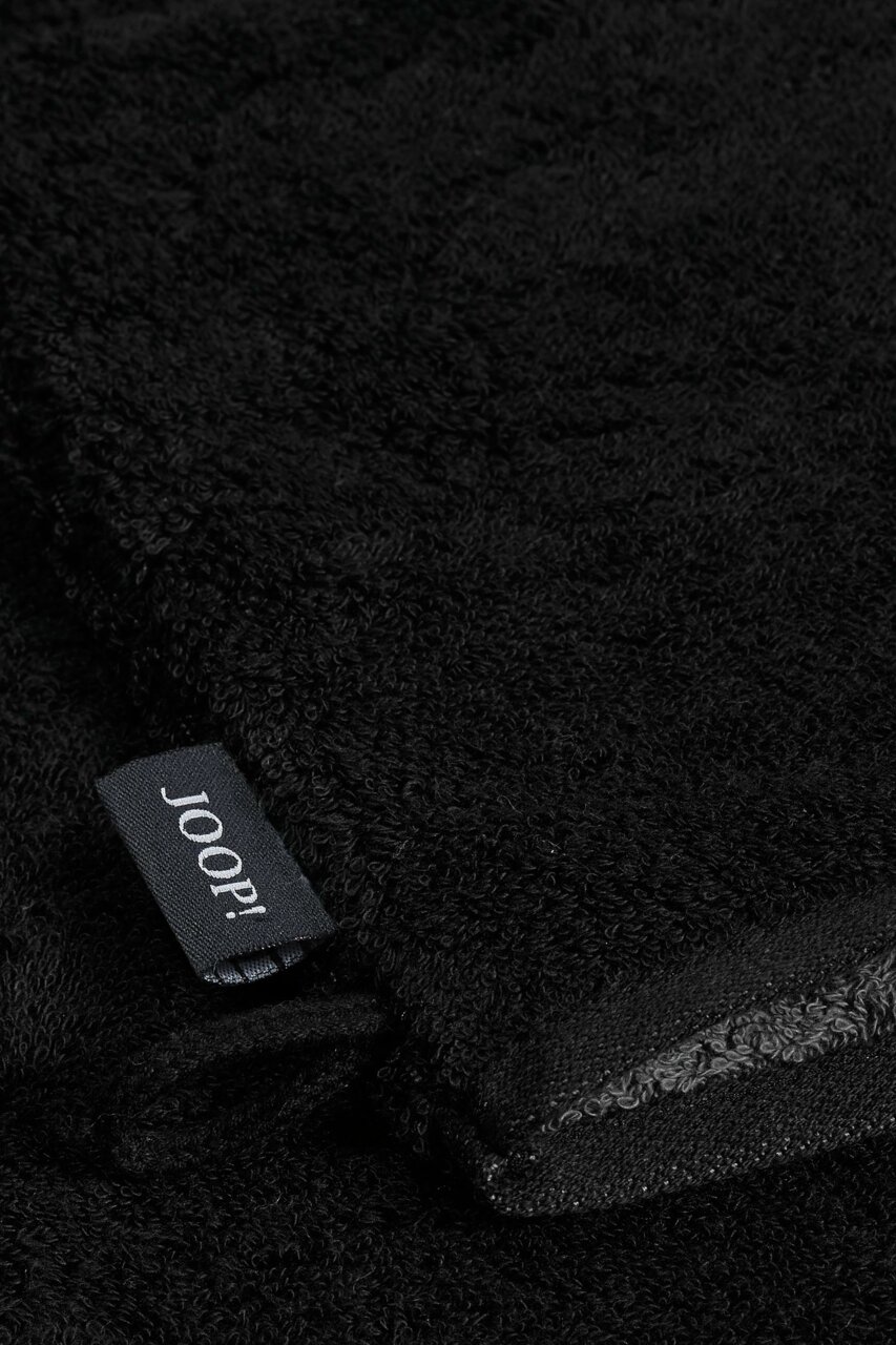 Zwarte washand van badstof met Joop-label, close-up