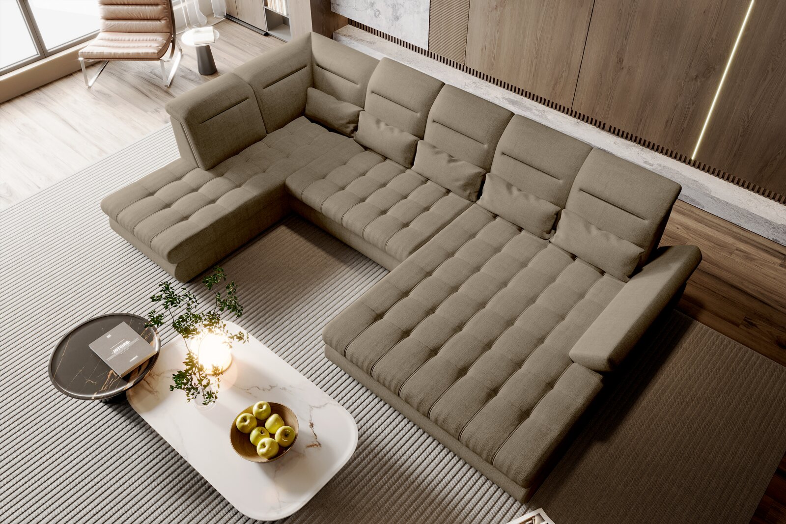 Beiges L-förmiges Ecksofa mit gesteppten Sitzflächen und verstellbaren Rückenlehnen in modernem Wohnzimmer, fotografiert aus schräger Vogelperspektive von oben.