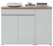 Frontansicht einer modernen Kombi-Kommode mit weißer Oberfläche und Holzplatte, dekoriert mit Büchern und einer Schale.