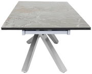 Moderne eettafel met tafelblad in marmerlook en metalen onderstel, zijaanzicht