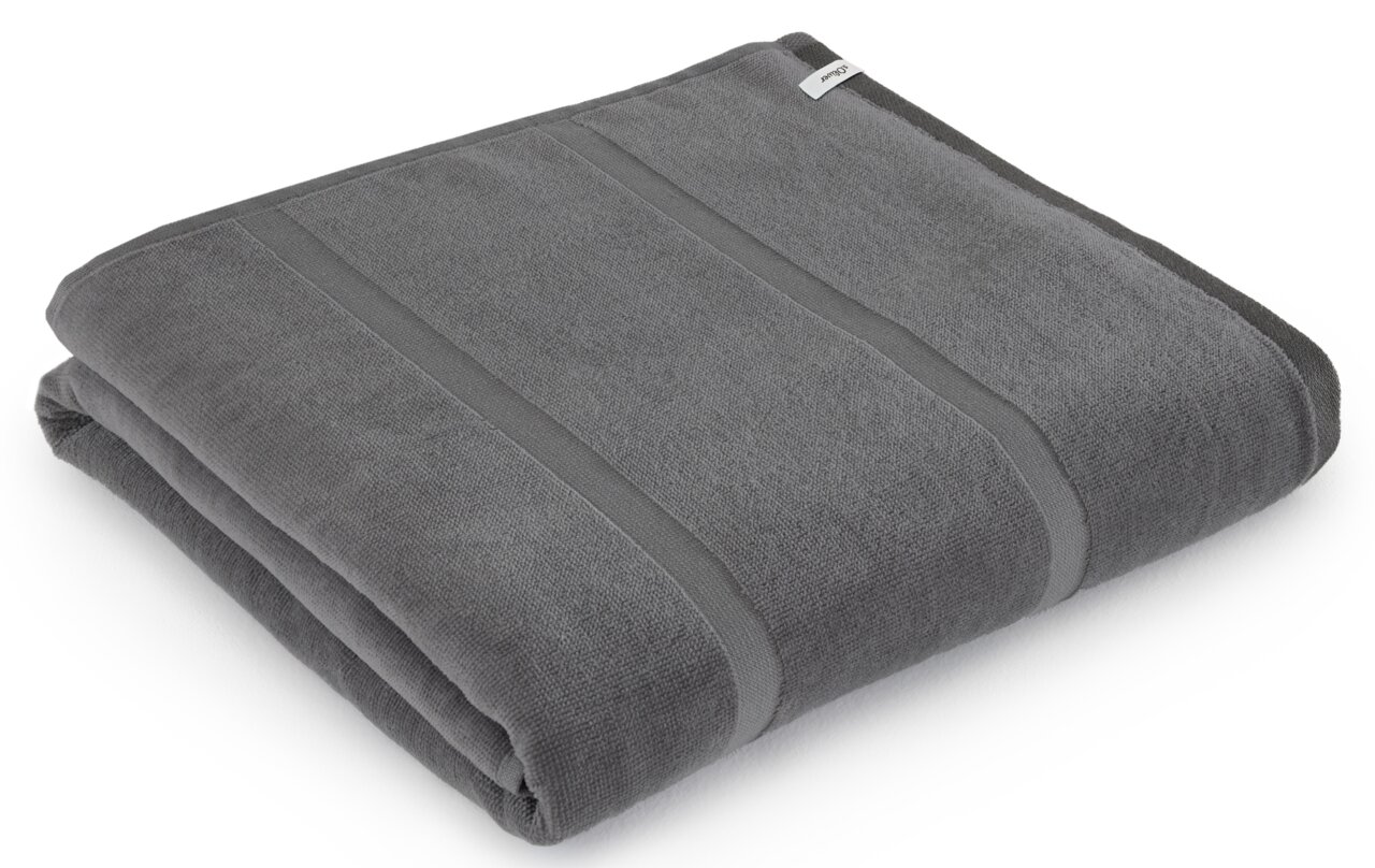 Graues, gefaltetes Strandtuch in der Größe 90x180cm, seitliche Perspektive