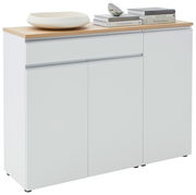 Weiße Kombi-Kommode mit Holzplatte, dekoriert mit Büchern und einer Schale, seitliche Perspektive