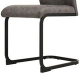 Moderner Schwingstuhl mit grauem Polstersitz und schwarzem Metallgestell, seitliche Perspektive