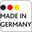 Logo mit der Aufschrift 'Made in Germany' in schwarzer Schrift, begleitet von drei Kreisen in den Farben Schwarz, Rot und Gelb, die die deutsche Flagge symbolisieren. Frontalansicht.