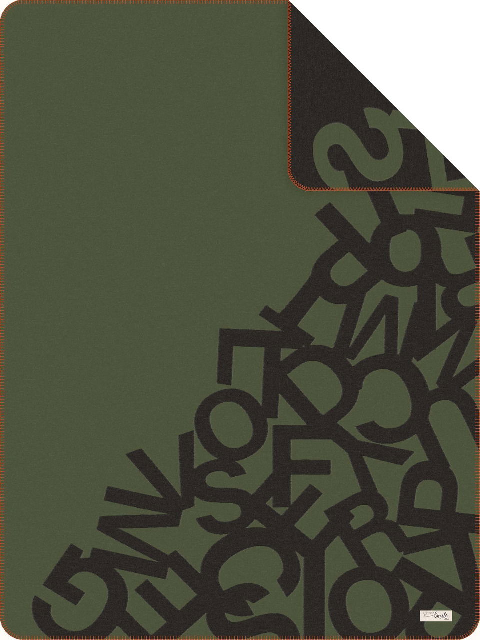 Grüne Jacquard-Decke mit schwarzem Buchstabenmuster, s.Oliver, aus der Vogelperspektive