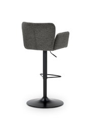 Achterkant van een moderne barkruk met grijze stoffen bekleding en een zwart metalen frame.