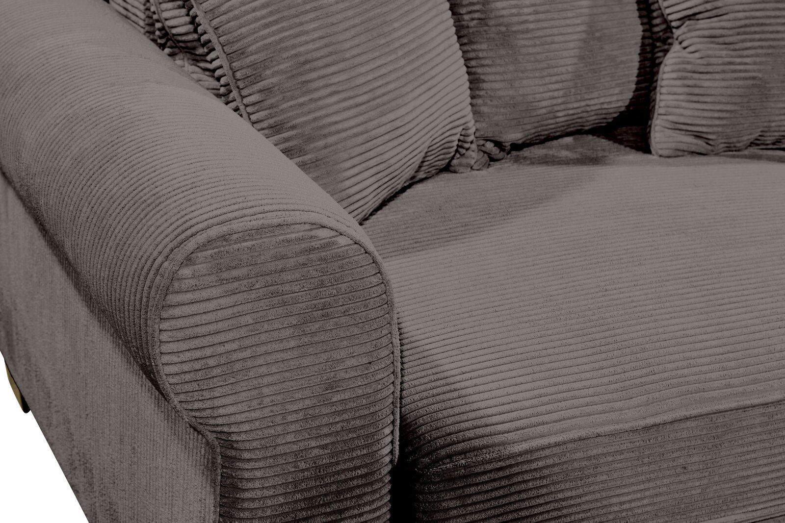 Nahaufnahme einer grauen, gerippten Sofaecke mit Armlehne, von schräg oben fotografiert.