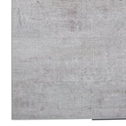 Nahaufnahme der Oberfläche eines Eckschreibtisches in Betonoptik, perspektivisch von oben betrachtet.