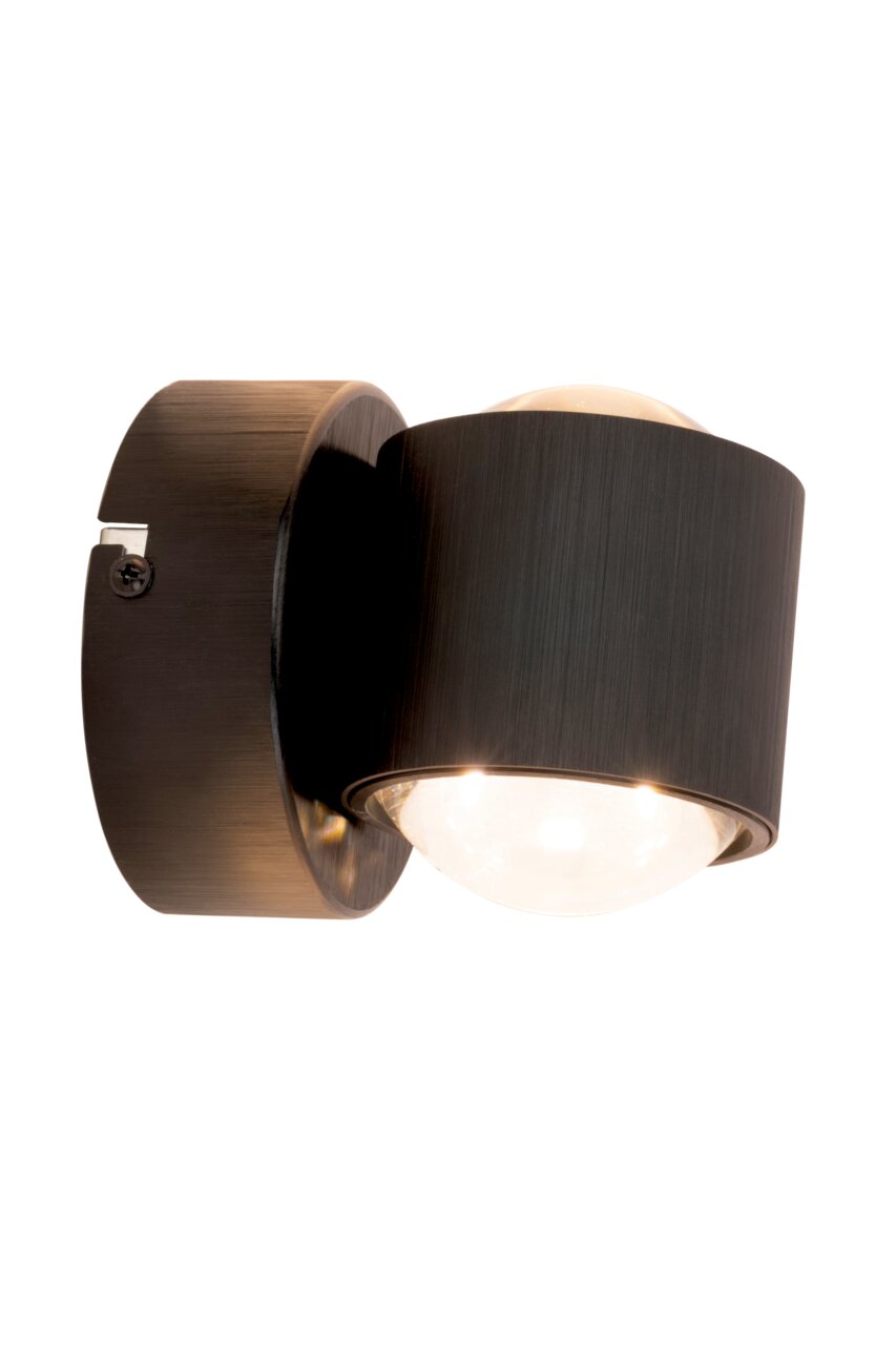 LED-Wandleuchte in seitlicher Perspektive mit modernem, dunklem Design und rundem Leuchtkörper.