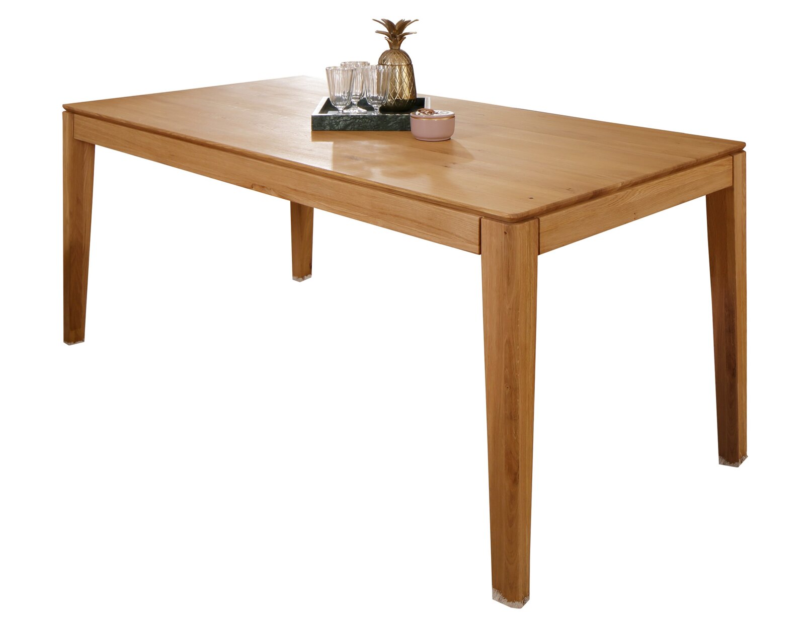 Holzesstisch mit rechteckiger Tischplatte, dekoriert mit Gläsern und einer Ananas, seitliche Perspektive