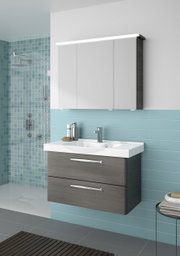 Moderner Badblock mit Waschbecken und Unterschrank in Holzoptik, frontal betrachtet, vor einer Wand mit blauen Fliesen.