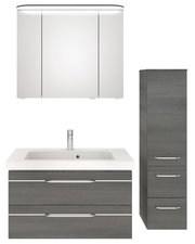 Badezimmermöbel-Set bestehend aus einem Spiegelschrank, einem Waschtisch mit Unterschrank und einem Hochschrank in moderner, grauer Holzoptik, frontal betrachtet.