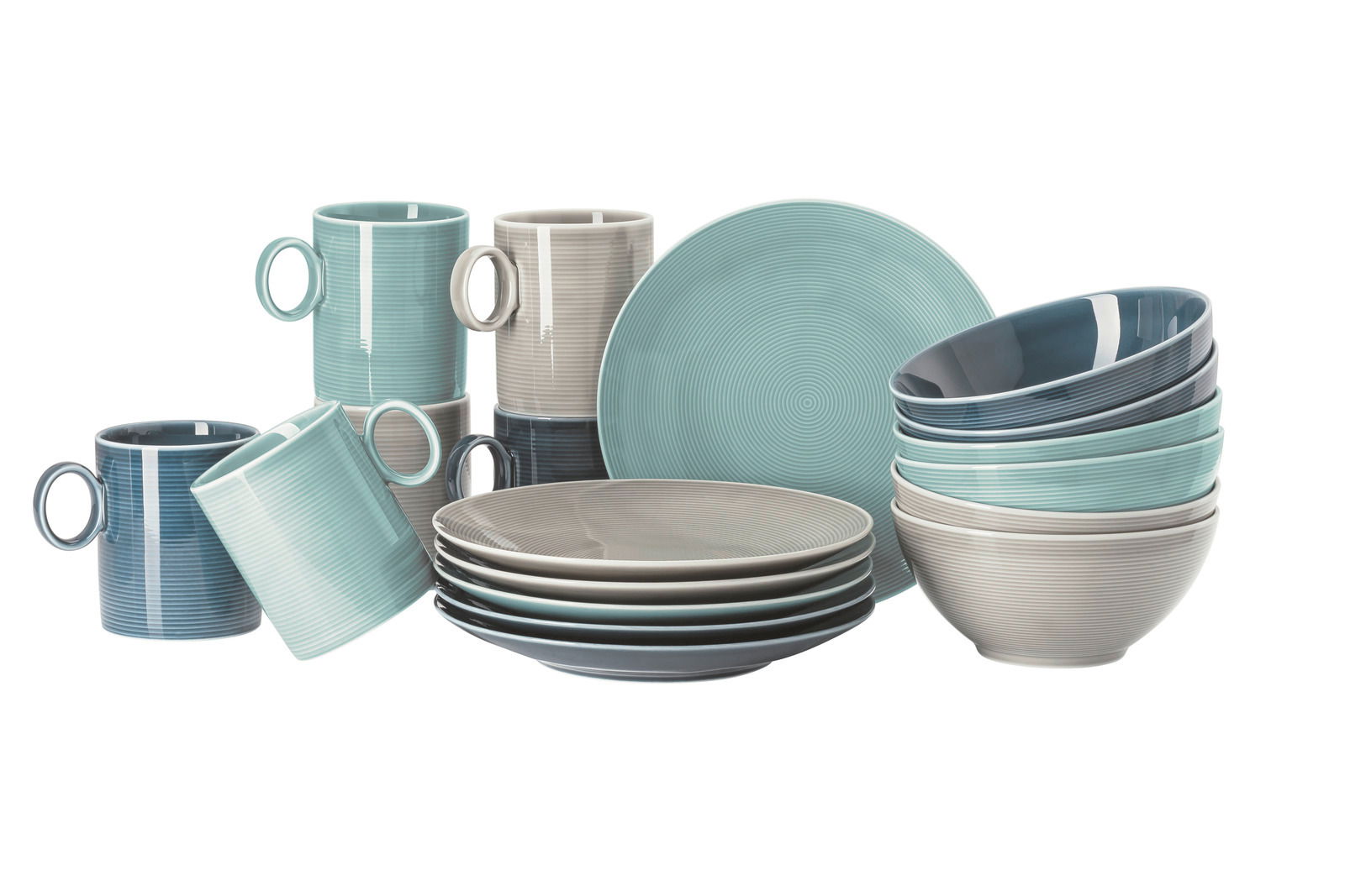Thomas Kaffeeservice 18-tlg. LOFT NORDIC COLOURS Kaffeeservice Loft 18-tlg. in verschiedenen Farben, bestehend aus Tassen, Tellern und Schalen, aus seitlicher Perspektive fotografiert.