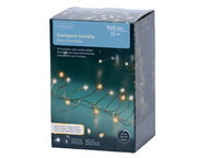Verpackung der Lumineo Compact Twinkle Micro LED Lichterkette mit 960 warmweißen LEDs auf 12 m Länge, seitliche Perspektive