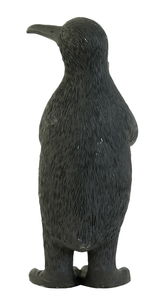 Rückansicht einer schwarzen Pinguin-förmigen Tischleuchte, die aufrecht steht.