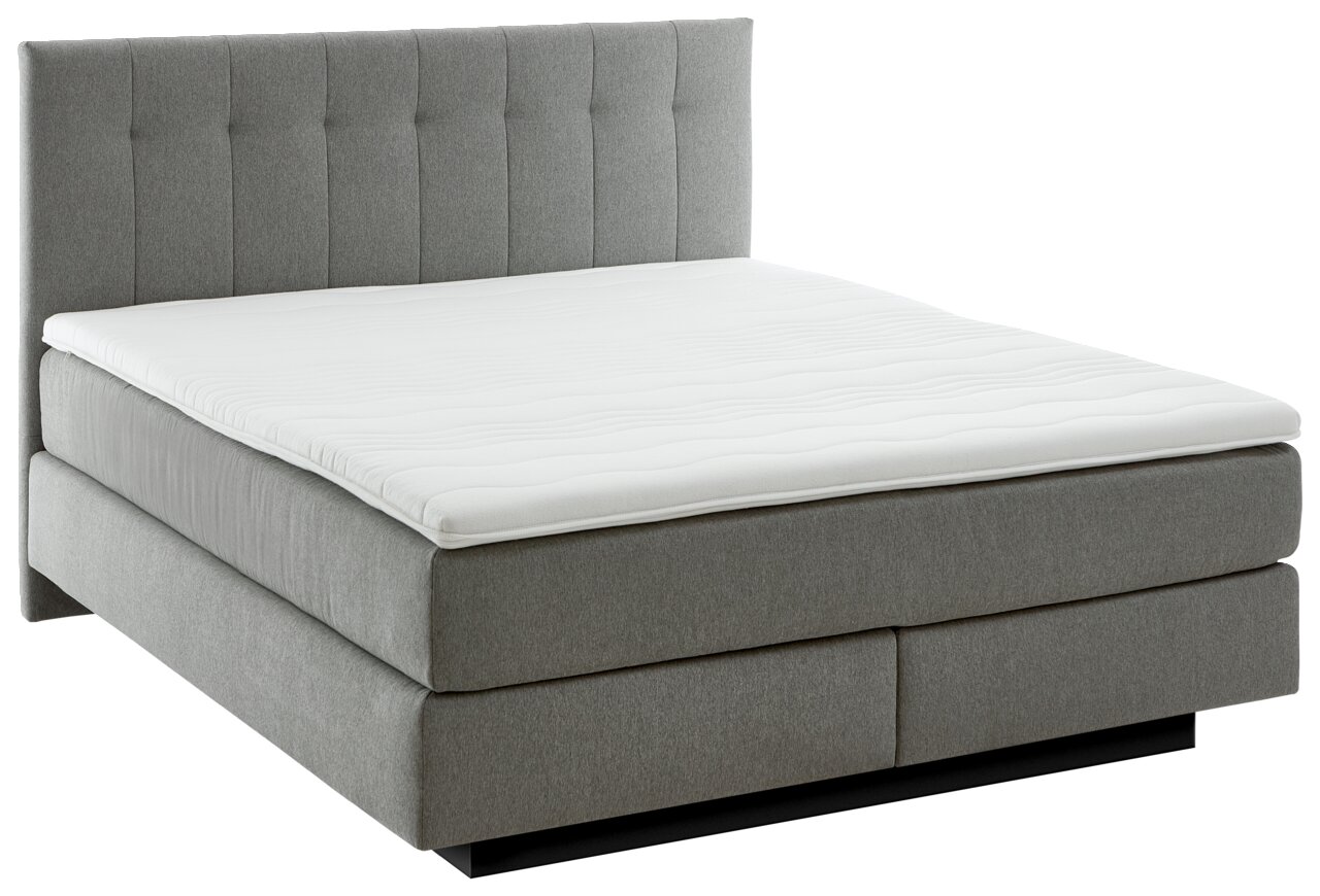 Graues Boxspringbett BX 180/200 mit gestepptem Kopfteil, seitliche Perspektive