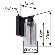 Moderne Wandleuchte mit klarem Glaszylinder und schwarzer Halterung, seitliche Perspektive