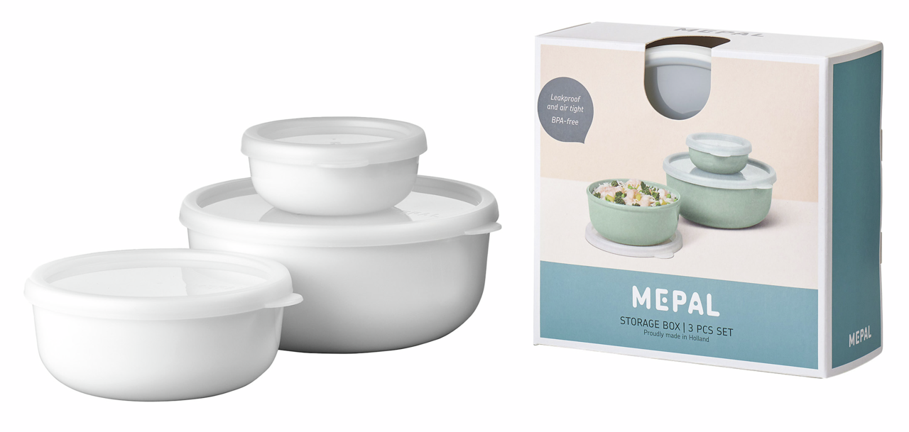 Dreiteiliges weißes Vorratsdosen-Set Lumina von Mepal, bestehend aus stapelbaren runden Behältern mit Deckeln, abgebildet in einer leicht seitlichen Perspektive neben der Produktverpackung.