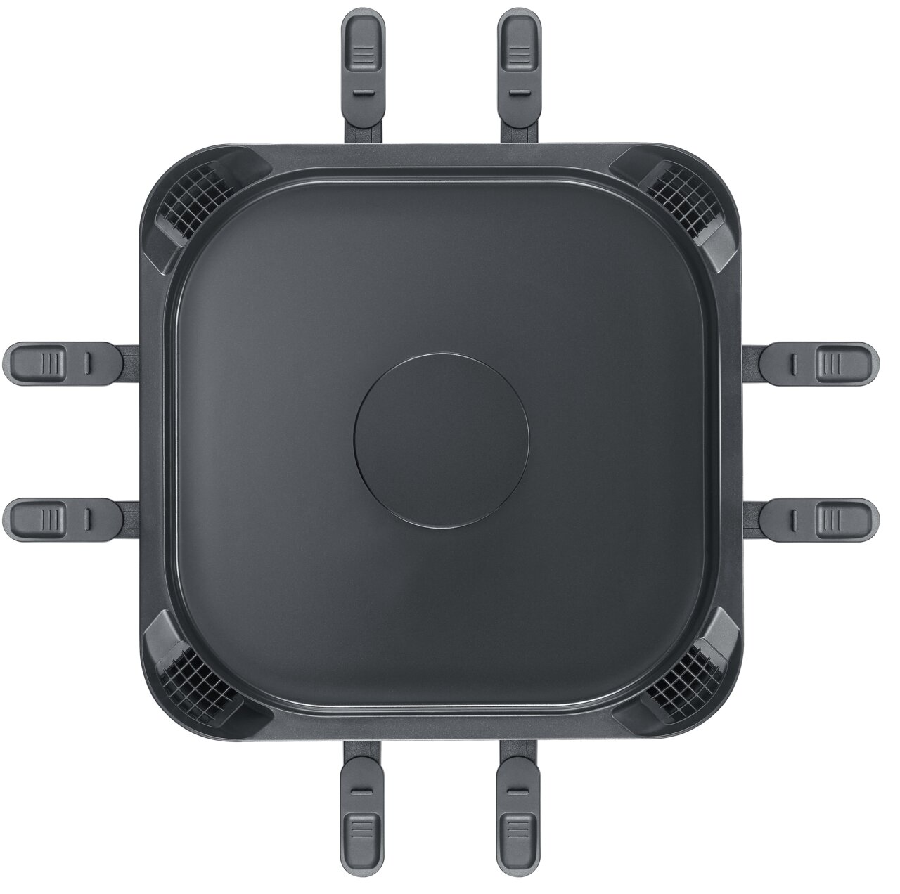 Draufsicht auf ein quadratisches, rauchfreies Raclette-Gerät mit acht Pfännchenhaltern.