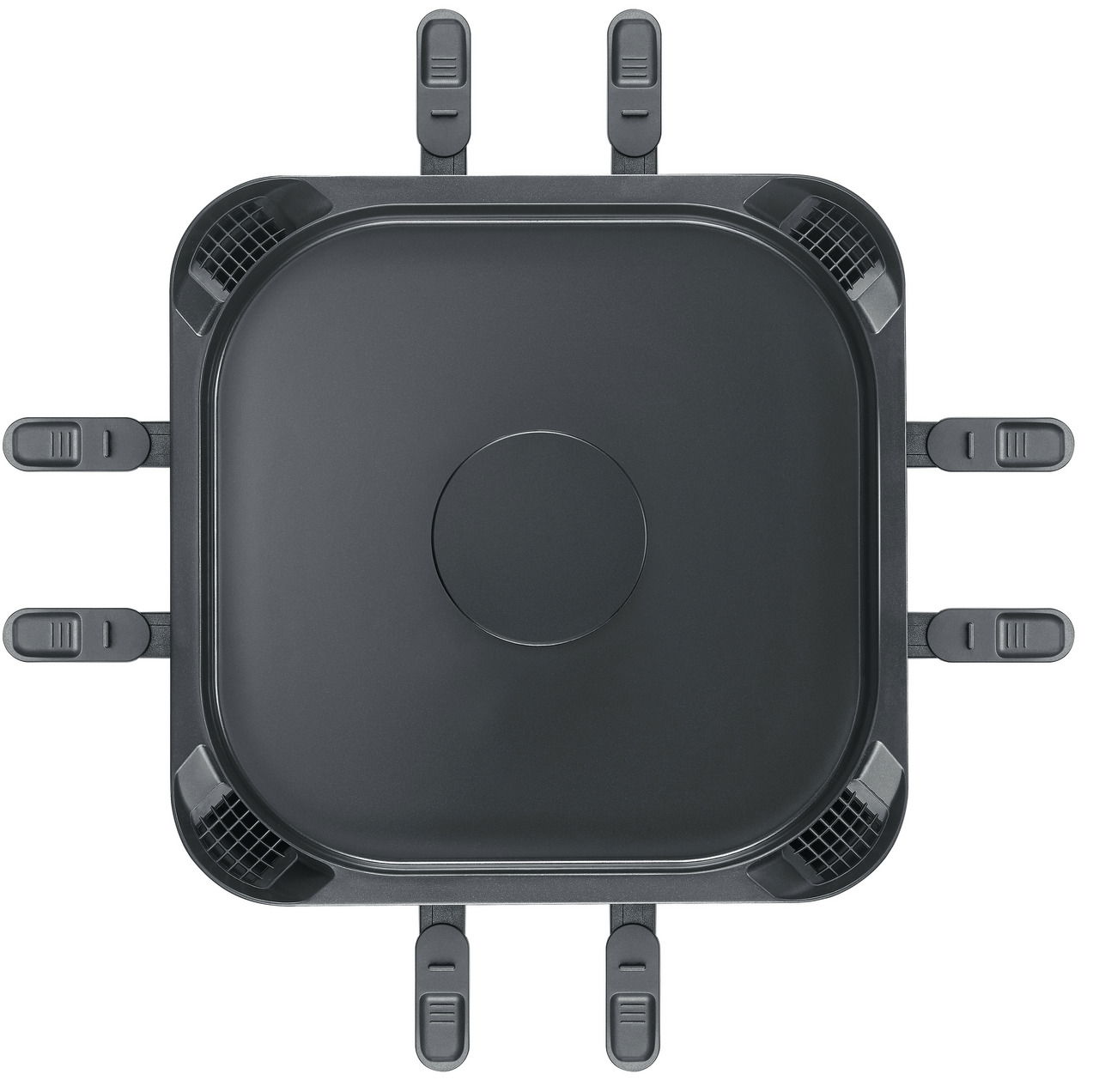 Draufsicht auf ein quadratisches, rauchfreies Raclette-Gerät mit acht Pfännchenhaltern.