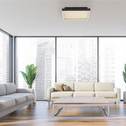 Moderne Deckenleuchte Q-MAGONG in einem stilvollen Wohnzimmer, aus der Perspektive von unten betrachtet.