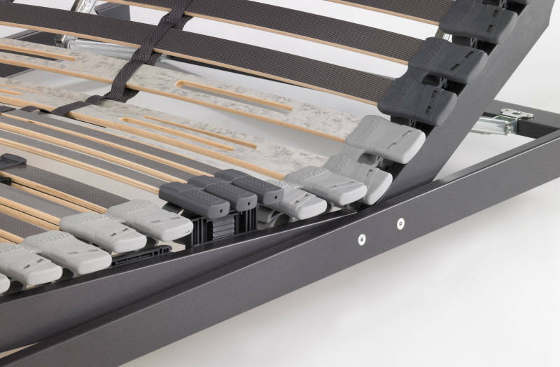 Detailansicht eines verstellbaren Lattenrosts 90 x 200 cm mit flexiblen Federleisten und stabilen Kunststoffelementen.