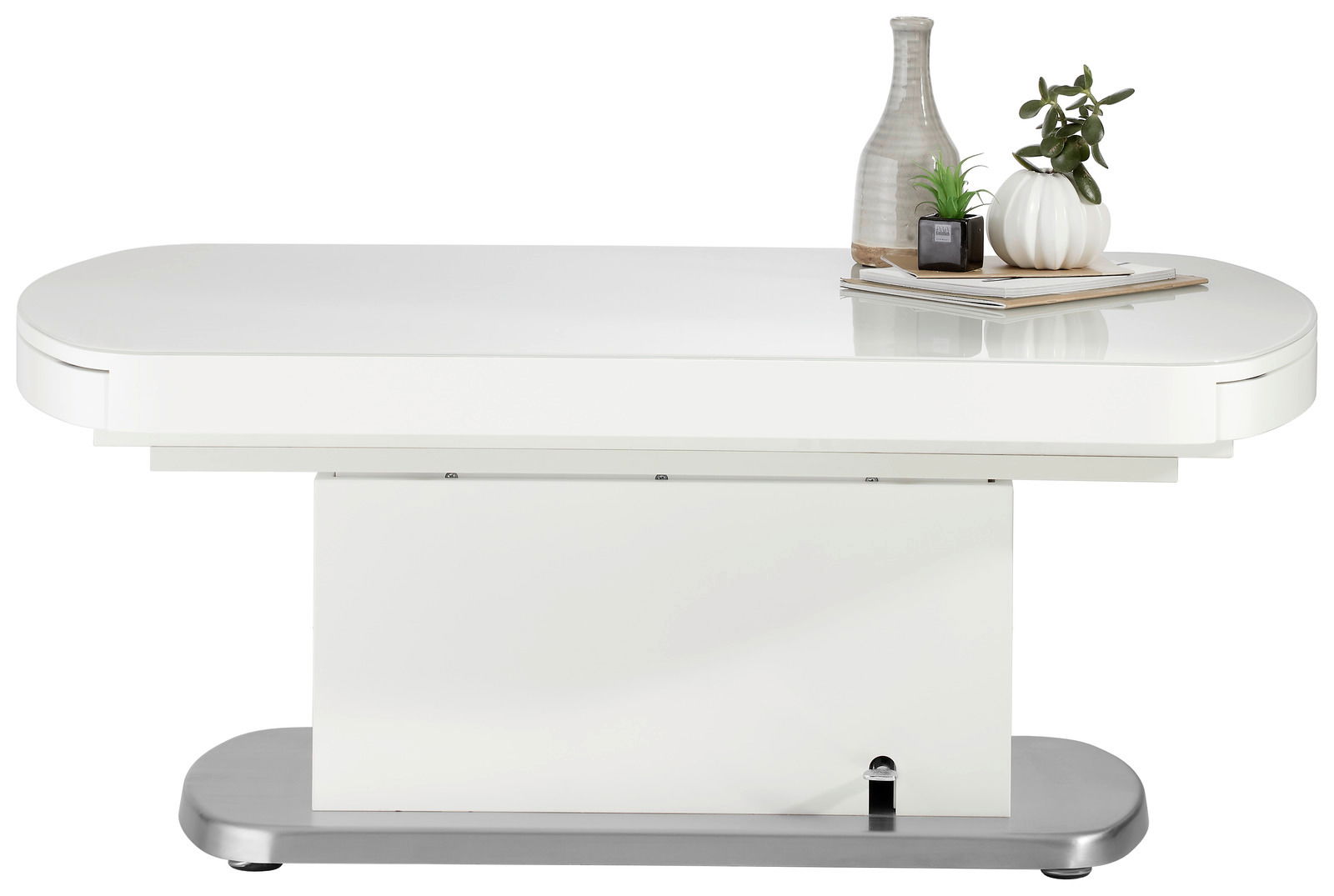 Moderner weißer Couchtisch mit abgerundeten Ecken, dekoriert mit einer Vase und Pflanzen, seitliche Perspektive