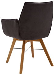 Rückansicht eines Armlehnenstuhls mit dunklem Polster und Holzbeinen