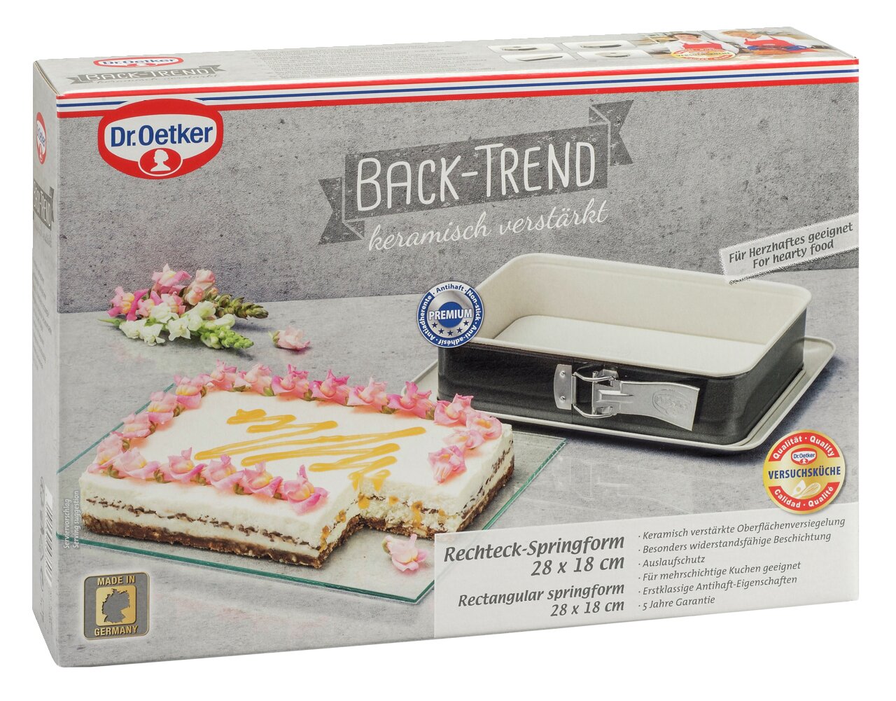 Rechteckige Springform 28x18 cm von Dr. Oetker, keramikverstärkt, geeignet für herzhafte Speisen, abgebildet in einer schrägen Perspektive auf der Verpackung.