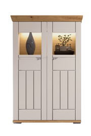 Frontansicht eines modernen Highboards mit Holzdetails und beleuchteten Fächern, dekoriert mit einer Vase und Pflanzen.