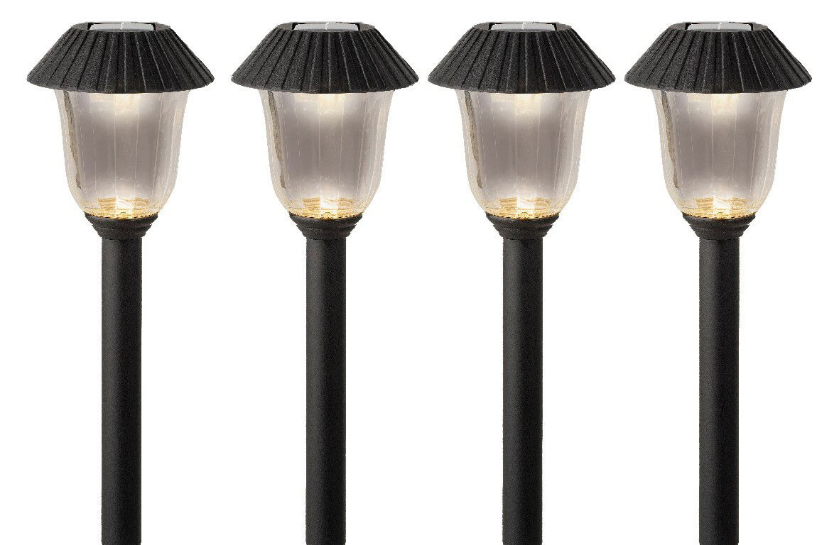 Vier schwarze Solar Stabbeleuchten mit transparentem Lampenschirm, frontal betrachtet.