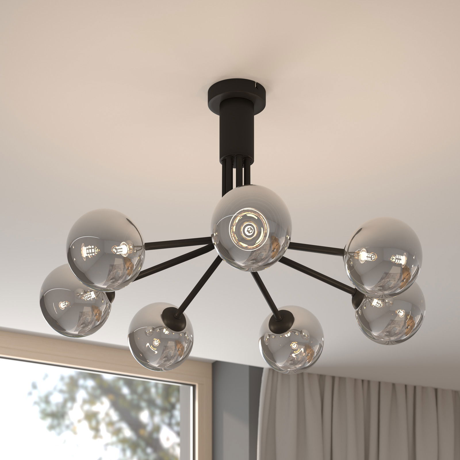 Moderne Deckenleuchte mit mehreren kugelförmigen Glaskörpern, von unten betrachtet.