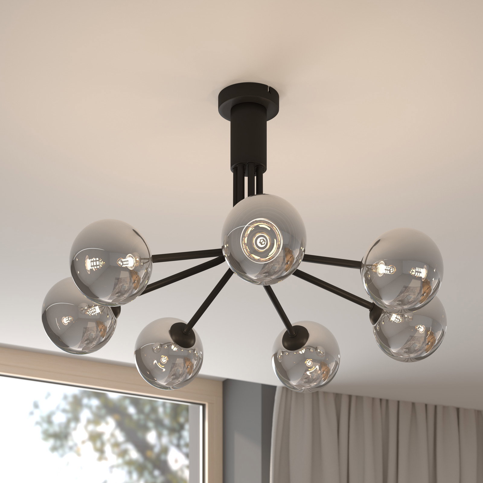 Moderne Deckenleuchte mit mehreren kugelförmigen Glaskörpern, von unten betrachtet.