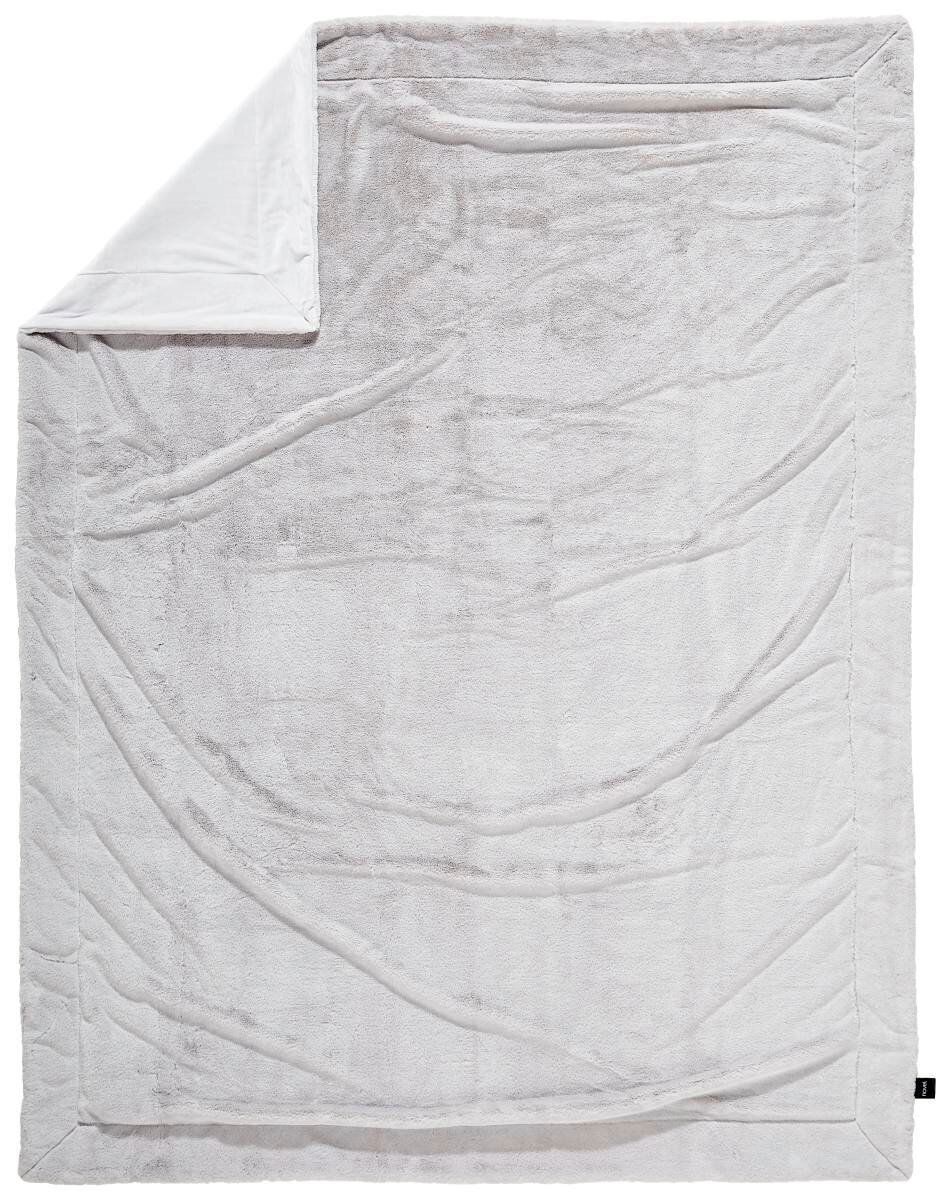 Novel Felldecke 150x200 cm YUKON Obenansicht einer großen, weichen Felldecke in hellem Grau mit umgeschlagener Ecke.