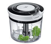 Multischneider Turbo aus der Vogelperspektive mit transparentem Behälter und Kräutern im Inneren