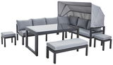 Modernes Dining-Lounge-Set mit grauen Polstern und einem Tisch mit Glasplatte, aus seitlicher Perspektive fotografiert.